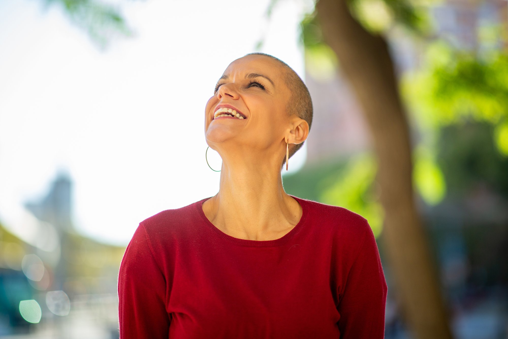 Woman Looking Up and Smiling
